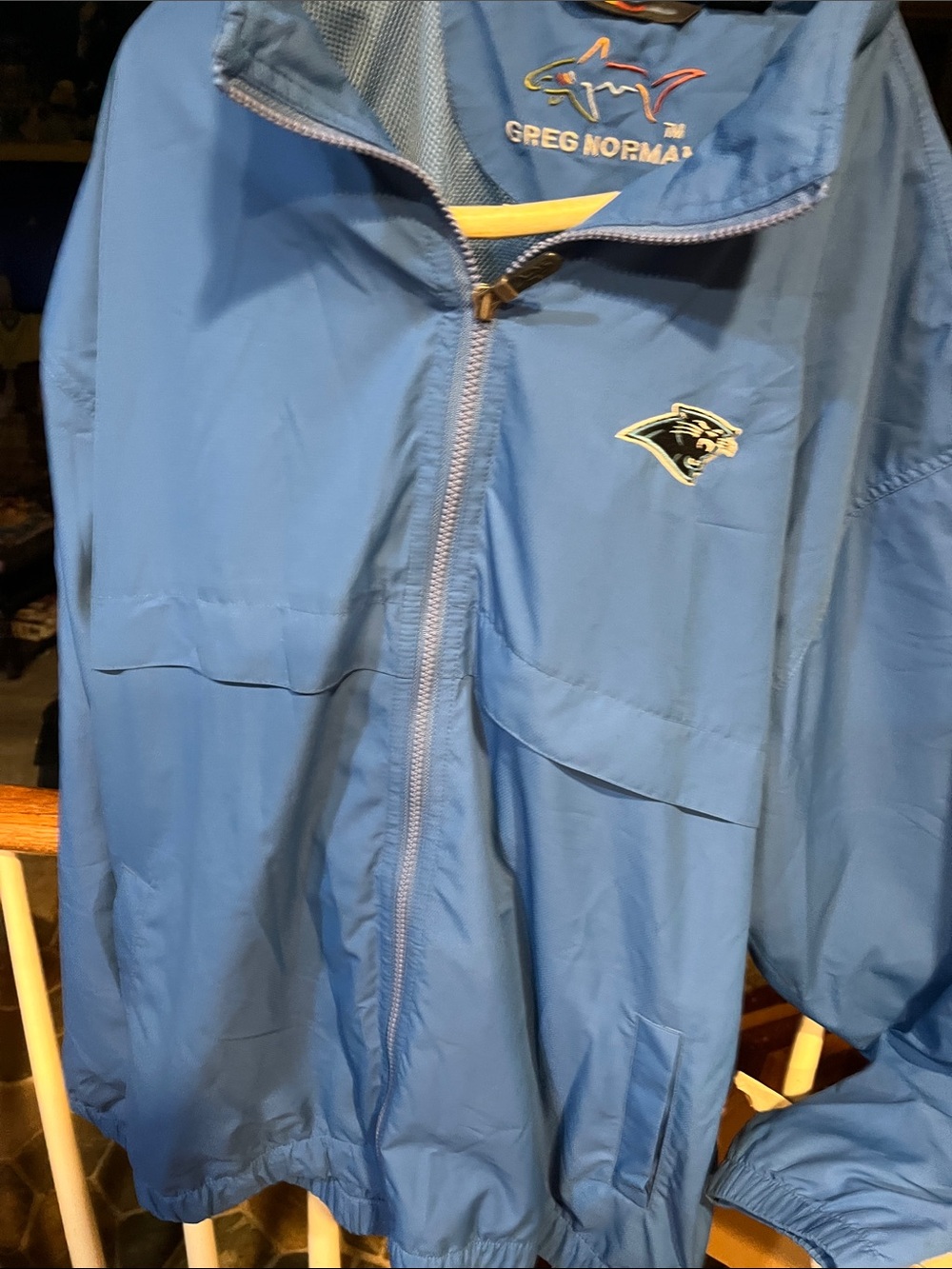 Greg Norman Collection Light Blue Kids Rain Jacket with Embroidered Logo